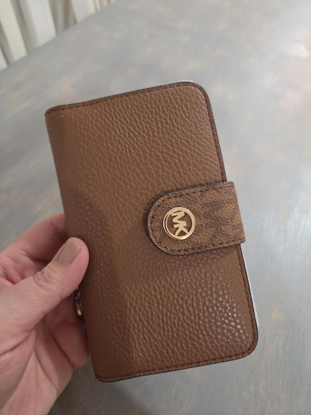 Michael Kors Brown Pebbled Leather Wallet-Style Phone Case with Gold MK Logo